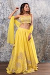 Buy Yellow Raw Silk Sweetheart Neck Hand Embroidered Lehenga Set For