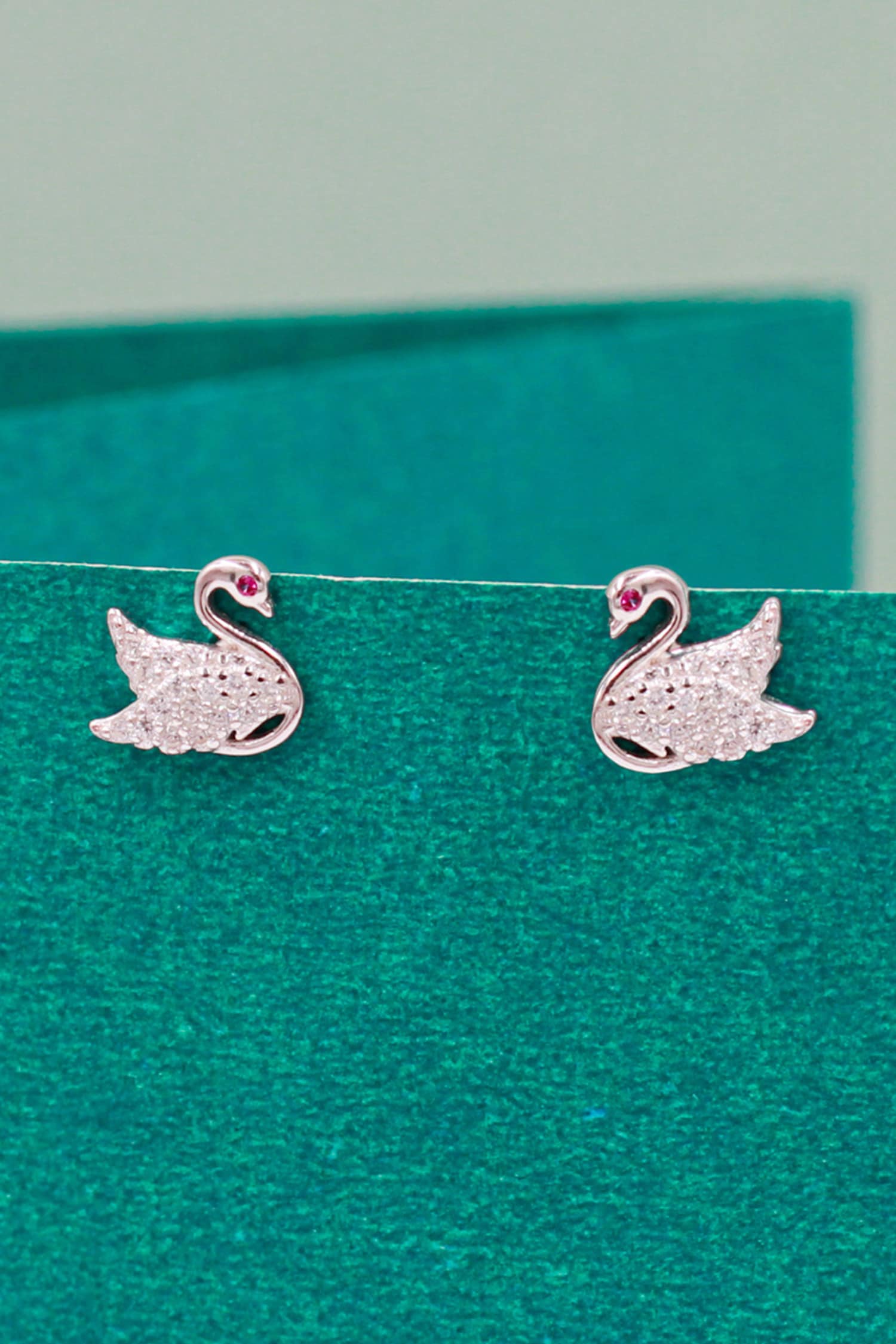 Buy Silver Plated Cubic Zirconia Embellished Swan Stud Earrings By