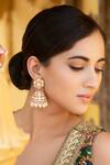 Shop_Curio Cottage_Kundan And Pearl Embellished Jhumka Earrings_at_Aza_Fashions
