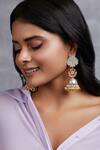 Shop_Curio Cottage_Aria Floral Carved Jhumka Earrings_at_Aza_Fashions