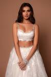 Shop_Shehlaa Khan_White Lace Blouse And Lehenga Set_at_Aza_Fashions