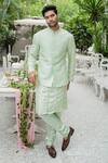 Buy_Varun Chakkilam_Green Twill Silk Embroidered Bundi Kurta Set_at_Aza_Fashions
