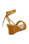Shop_Veruschka by Payal Kothari_Orange Faux Leather Textured Tie Up Wedge Sandals_at_Aza_Fashions