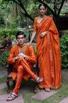 Shop_Deepthee_Orange Silk Yoke Embroidered Kurta And Churidar Set_at_Aza_Fashions