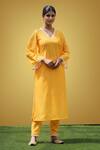 Buy_Rivaaj Clothing_Yellow Woven Muslin Bandhani Print Kurta And Pant Set_at_Aza_Fashions