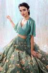Buy_Taavare_Green Tulle Floral Embroidered Lehenga Set_at_Aza_Fashions