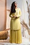 Buy_Kanj by Priyanka A Sakhuja_Yellow Georgette Embroidered Sequin Round Miyar Layered Kurta _at_Aza_Fashions