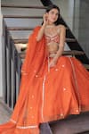 Buy_Silky Bindra_Orange Organza Embroidered Mirror Sweetheart Neck Work Bridal Lehenga Set _at_Aza_Fashions