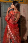 Buy_Vana Ethnics_Orange Viscose Printed Floral Scallop V Neck Pleated Bridal Lehenga Set 