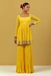 Ikshita Choudhary_Yellow Georgette, Organza Embroidery Round Neck, Hand Peplum Kurta Gharara Set _Online_at_Aza_Fashions