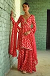 Buy_KARAJ JAIPUR_Red Kurta And Sharara- Muslin Printed Floret Buttis V Neck Flared Set _at_Aza_Fashions