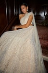 Buy Nadine Dhody Off White Tulle Pearls, Sequins, Crystals, Elode Hand Embroidered Lehenga Set at Aza Fashions Buy_Nadine Dhody_Off White Tulle Pearls, Sequins, Crystals, Elode Hand Embroidered Lehenga Set _at_Aza_Fashions