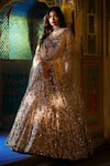 Buy_Seema Gujral_Gold Net Embroidered Jewel Sweetheart Neck Tone Bridal Lehenga Set  _at_Aza_Fashions