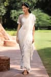 Buy_Tarini Vij_White Blouse Net And Satin Hand Pre-stitched Ruffle Skirt Saree & Set _at_Aza_Fashions