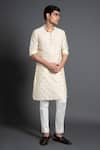 Buy_Raghavendra Rathore Jodhpur_Off White Chanderi Silk Embroidered Thread Floral Woven Kurta _at_Aza_Fashions