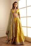 Buy_Studio Iris India_Yellow Banarasi Silk Embroidery Sequins Plunge V Zari Border Lehenga Set _at_Aza_Fashions