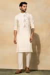 Buy_Diyarajvvir_White Cotton Cut Work Flower Placement Embroidered Kurta Set _at_Aza_Fashions
