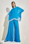 Buy_NAMRATA JOSHIPURA_Blue Georgette Hand Embellished Floral Patterns Round Wisteria Cape Jumpsuit_at_Aza_Fashions