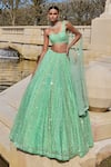Buy_Seema Gujral_Green Net Embroidery Sequin One Shoulder Blouse And Lehenga Set _at_Aza_Fashions