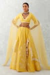 Buy_Devnaagri_Yellow Raw And Organza Embroidery Thread Blunt V Floral Lehenga Set _at_Aza_Fashions