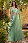 Buy_Suruchi Parakh_Green Georgette Printed And Hand Embellished Floral Lehenga Saree & Blouse Set _at_Aza_Fashions