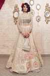 Buy_Show Shaa_Ivory Organza, Net, Satin Mirrors, Floral Hand Embroidered Bridal Lehenga Set _at_Aza_Fashions