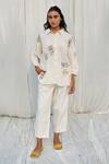 Buy Ayaka White Cotton Embroidery Collared Flower Applique Shirt at Aza Fashions Buy_Ayaka_White Cotton Embroidery Collared Flower Applique Shirt _at_Aza_Fashions