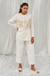 Buy Ayaka White Cotton Embroidery Round Neck Floral Straight Top at Aza Fashions Buy_Ayaka_White Cotton Embroidery Round Neck Floral Straight Top _at_Aza_Fashions
