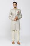 Buy_Samyukta Singhania_Beige Jacquard Silk, Pant Polyester Staple Fiber Geometric Pattern Sherwani Set_at_Aza_Fashions