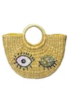 Buy_Gin & Tonic_Beige Sequin Winking Eye Embellished Basket Woven Beach Bag _at_Aza_Fashions