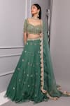 Buy_RIA SHAH LABEL_Green Organza Embroidered Floral Sweetheart Neck Lehenga Set _at_Aza_Fashions