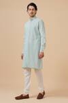 Buy_Raghavendra Rathore Blue_Sky Blue Raw Silk Criss Cross Pattern Kurta _at_Aza_Fashions