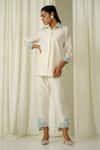 Buy Sakshi Khetterpal Ivory Chanderi Pearls, Beads, Embroidery Front Buttoned Shirt And Pant Set at Aza Fashions Buy_Sakshi Khetterpal_Ivory Chanderi Pearls, Beads, Embroidery Front Buttoned Shirt And Pant Set _at_Aza_Fashions