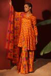 Buy_Shetab Kazmi_Orange Modal, Satin Mandarin Collar Floral Digital Print Peplum Top Gharara Set _at_Aza_Fashions