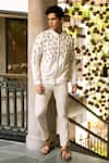 Buy_Vaani Beswal_Off White Handwoven Cotton Embroidered Thread Adeel Bomber Jacket _at_Aza_Fashions