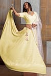 Buy_Monk & Mei_Yellow Chikankari Rayon Hand Embroidered Mallika Sunshine Lehenga Set _at_Aza_Fashions