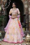 Buy_Nitisha Kashyap Official_Pink Net, Silk Sequins, Beads Asymmetric Tie And Dye Embroidered Lehenga Set _at_Aza_Fashions