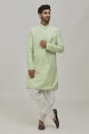 Buy_Arihant Rai Sinha_Green Silk Embroidered Floral Motifs Thread Kurta And White Patiala Pant Set _at_Aza_Fashions