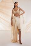 Buy_Divya Aggarwal_Ivory Satin Crystals, Pearls, Sequins V-neck Leaf Embroidered Cape Skirt Set _at_Aza_Fashions