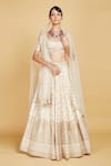 Buy_Amrin khan_Beige Blouse And Lehenga Handloom Raw Perwinkle Flower Bridal Set  _at_Aza_Fashions