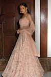 Buy_Nadine Dhody_Peach Tulle Embellished Beads Scoop Neck Crystal And Sequin Lehenga Set  _at_Aza_Fashions