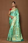Buy_Samyukta Singhania_Green Silk Woven Foliage Pattern Saree _at_Aza_Fashions