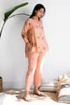 Buy_Kapraaaha_Peach Muslin Embroidered Floral Collared Neck Shirt And Pant Set _at_Aza_Fashions