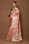 Buy_Samyukta Singhania_Peach Silk Woven Rose Blooming Border Saree _at_Aza_Fashions