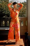 Buy_Paulmi and Harsh_Orange Crepe Printed Floral Patterns Collared Blissful Shirt And Pant Co-ord Set _at_Aza_Fashions