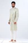 Buy_Shreyansh Designs_Ivory Dupion Silk Floral Cutdana And Pearl Embellished Sherwani _at_Aza_Fashions