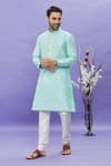 Buy_Arihant Rai Sinha_Green Jacquard Banarasi Silk Pintucks Geometric Pattern Mandarin Collar Kurta _at_Aza_Fashions