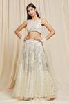Buy_Izzumi Mehta_Ivory Net Embroidered Floral Round Hand Lehenga Choli Set _at_Aza_Fashions