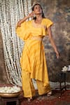 Buy_Kesar Studio_Yellow Silk Beads Asymmetric Shibori Dye Top And Overlay Pant Set_at_Aza_Fashions