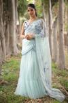 Buy_House of Tushaom_Blue Net Embroidery Sequin Leaf Neck Tiered Lehenga Saree With Blouse _at_Aza_Fashions